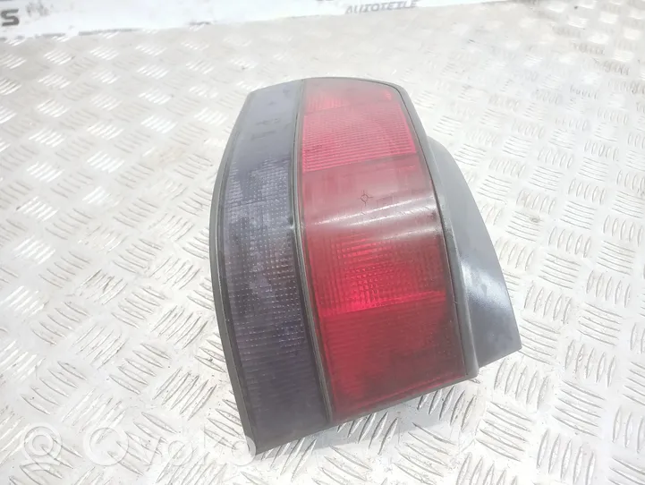 Renault Clio I Lampa tylna 7700796118