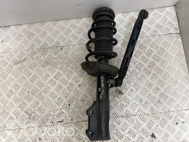 Opel Zafira C Front shock absorber with coil spring 13474031