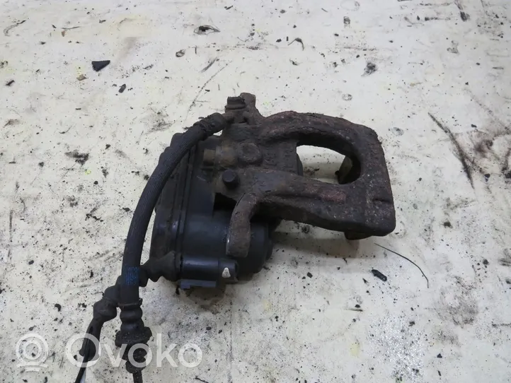 Nissan X-Trail T32 Caliper del freno trasero 