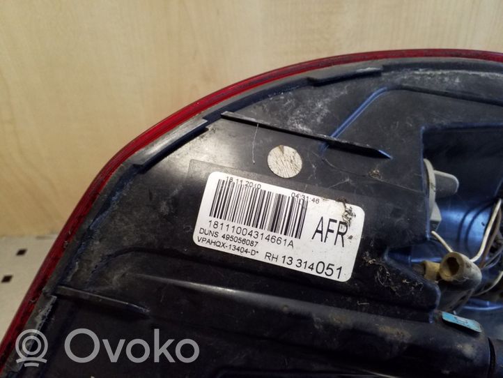 Opel Astra J Aizmugurējais lukturis virsbūvē 13282243