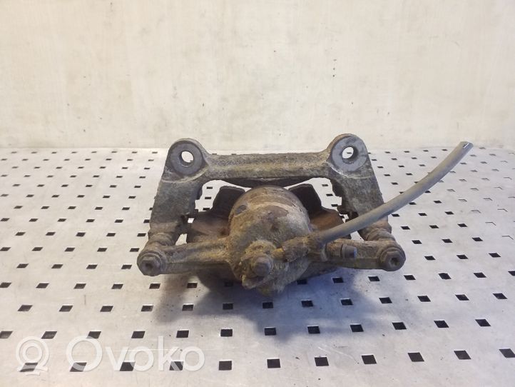 Volkswagen PASSAT B8 Caliper de freno delantero 