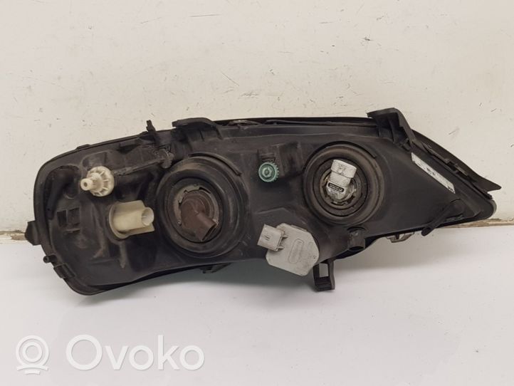 Opel Astra G Lampa przednia 24439602