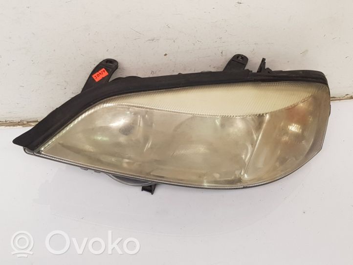 Opel Astra G Lampa przednia 24439602