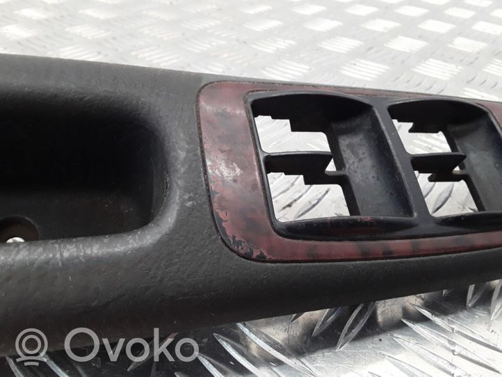 Toyota Avensis T220 Ramka przycisków otwierania szyby drzwi przednich 7423205090