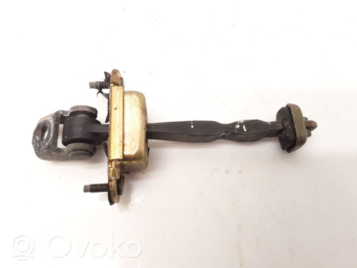 Ford Mondeo Mk III Tope freno de puerta delantera 210303