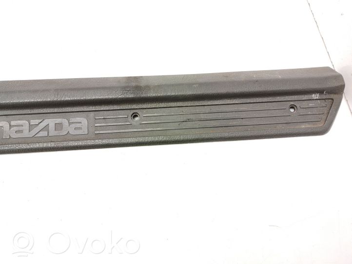 Mazda 929 Rivestimento anteriore minigonna laterale H2606871