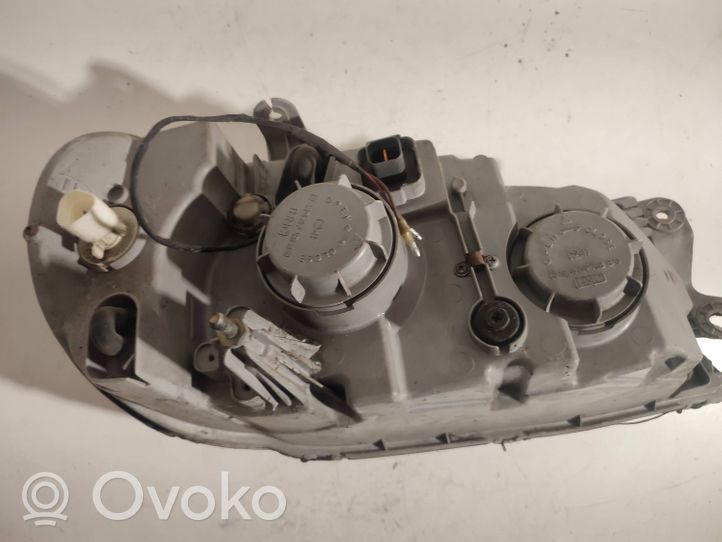 KIA Sedona Headlight/headlamp 0K53A51020