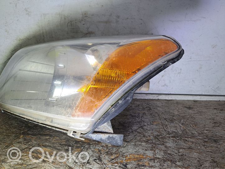 Dodge Caliber Lampa przednia 05303741AI