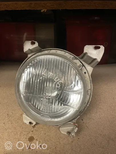 Volkswagen I LT Lampa przednia 304115367