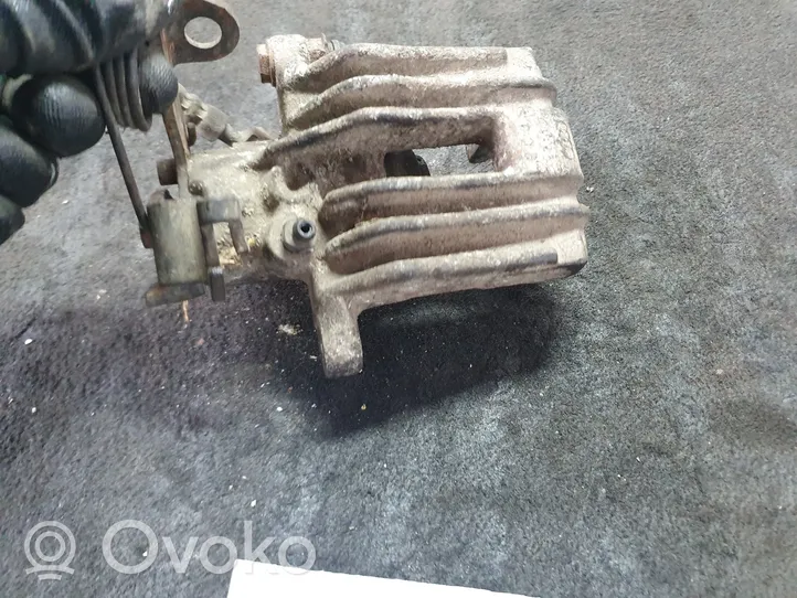 Volkswagen PASSAT B5 Caliper del freno trasero 