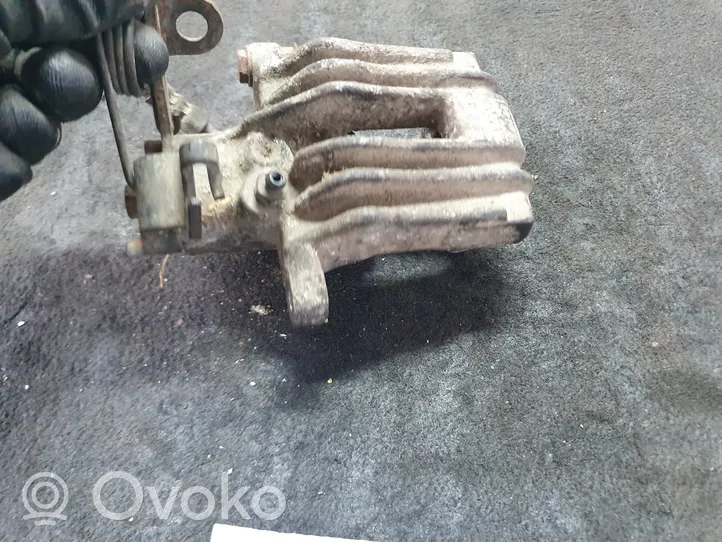 Volkswagen PASSAT B5 Caliper del freno trasero 