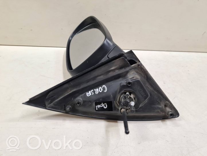 Opel Corsa C Manualne lusterko boczne drzwi przednich E1010676