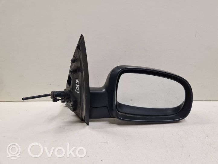 Opel Corsa C Manualne lusterko boczne drzwi przednich E1010676