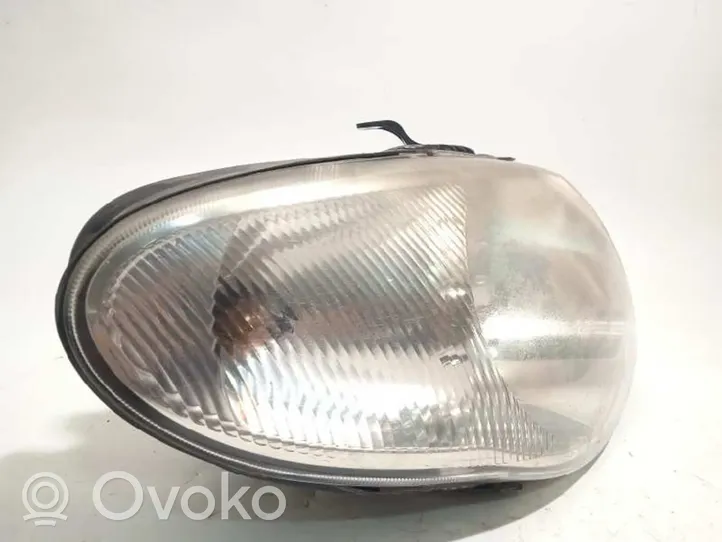 Chrysler Voyager Lampa przednia 04857830AC