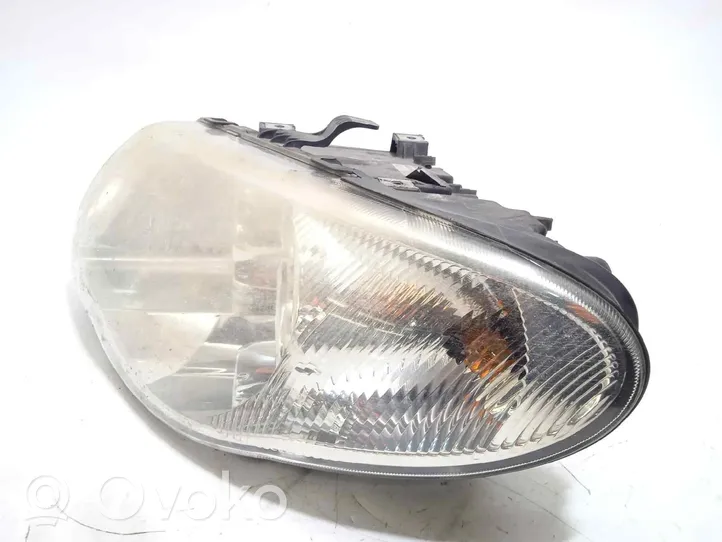 Chrysler Voyager Lampa przednia 04857831AC