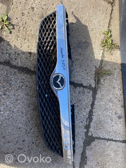 Mazda 323 Grille calandre supérieure de pare-chocs avant 