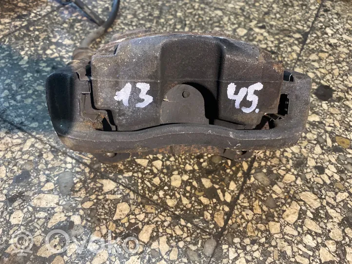 Opel Astra J Caliper de freno delantero 