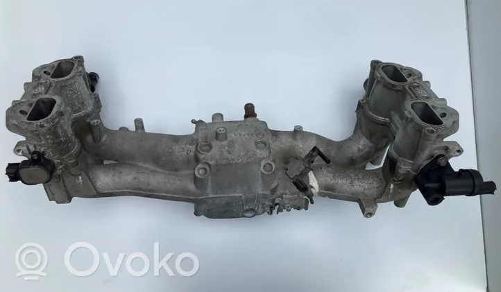 Subaru Impreza II Kolektor ssący 14011AB373