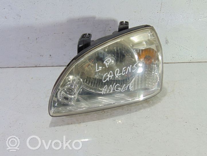 KIA Carens II Lampa przednia 