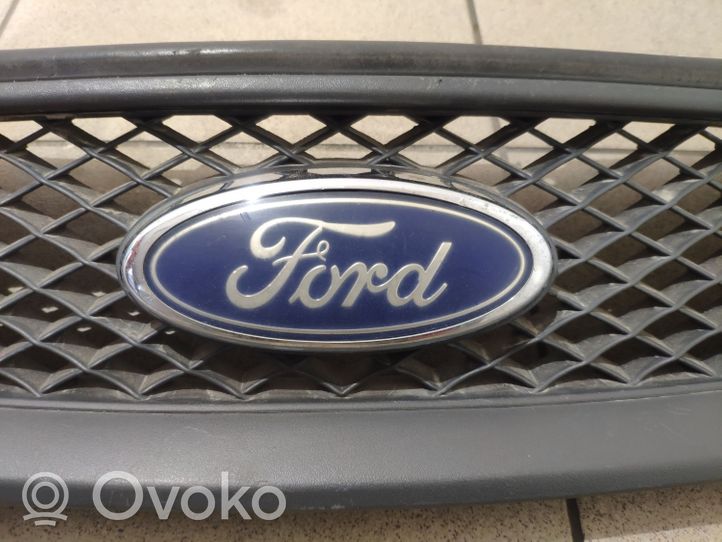 Ford Focus Maskownica / Grill / Atrapa górna chłodnicy 4M518138AE