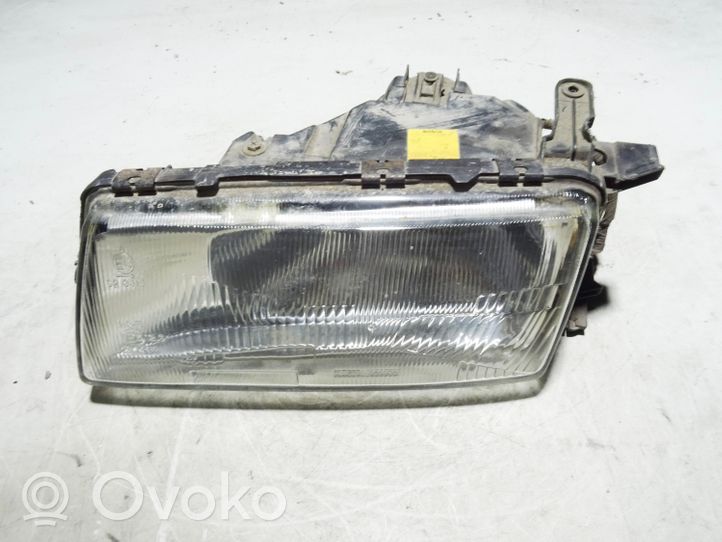 Opel Vectra A Lampa przednia 0301028105