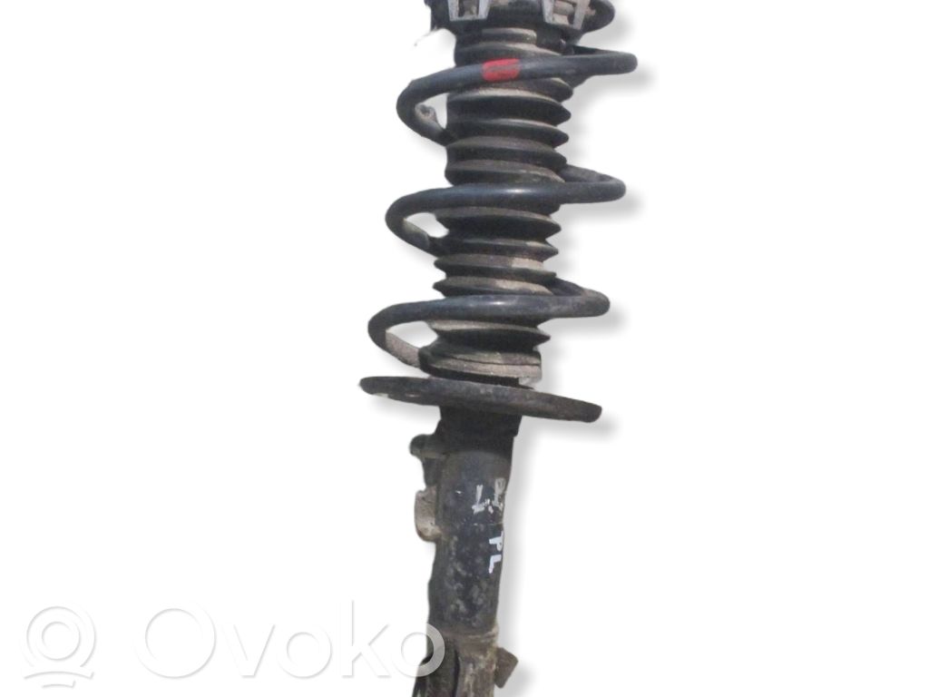 Front shock absorber with coil spring