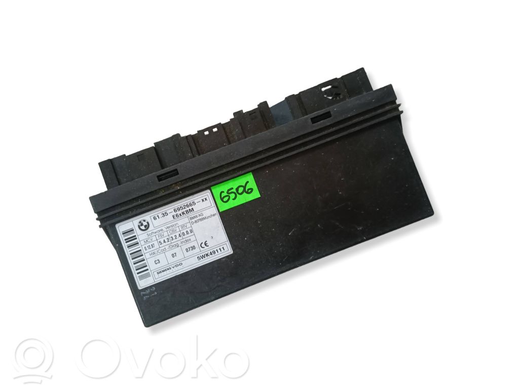 Блок управления двигателем ECU   5WK49111