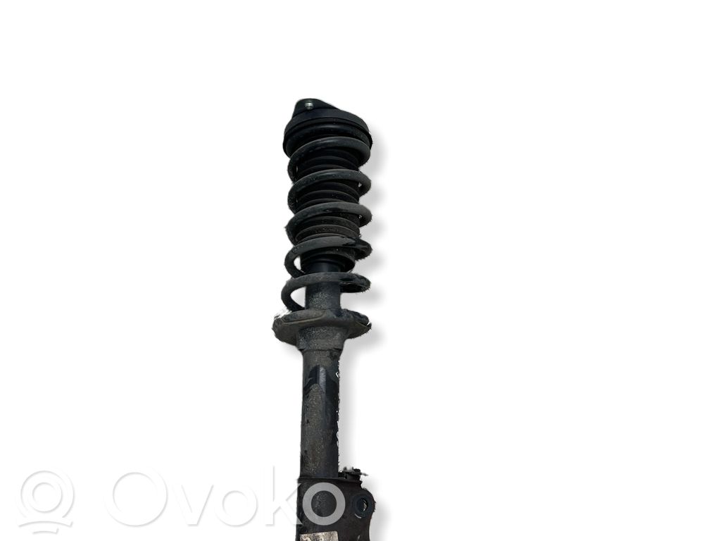 Dacia Spring Amortyzator osi przedniej ze sprężyną 