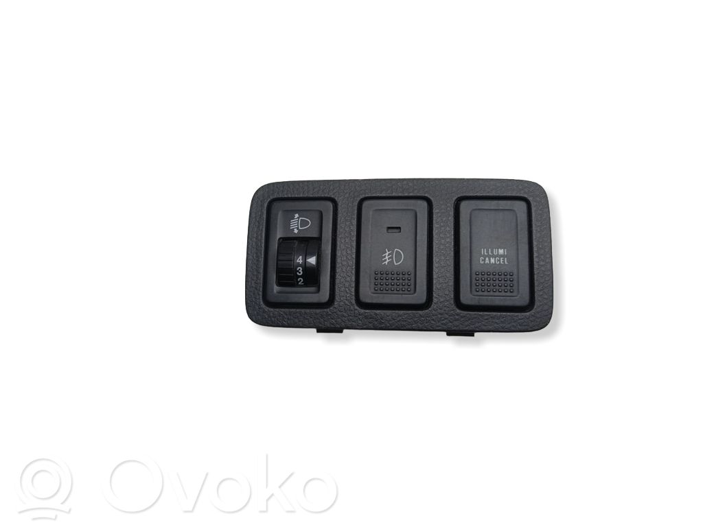 Suzuki Swift I Interruptor de control de altura del faro delantero 