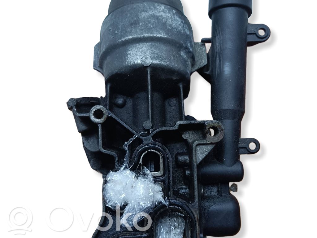 Opel Corsa D Oil filter mounting bracket 