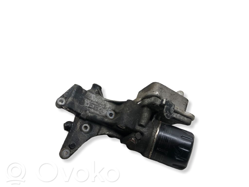 Volkswagen Golf V Mocowanie / uchwyt filtra oleju 