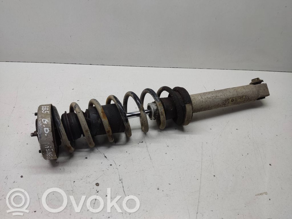 BMW 7 E65 E66 Takaiskunvaimennin kierrejousella 