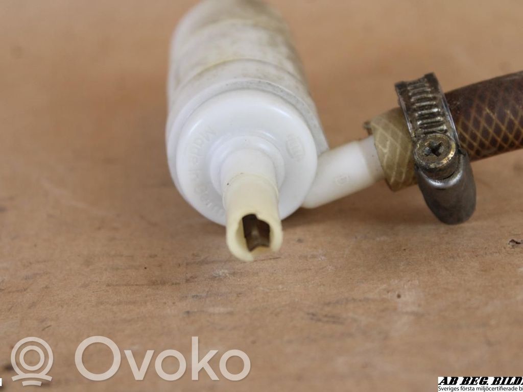 Volkswagen Polo I 86 Headlight washer pump 
