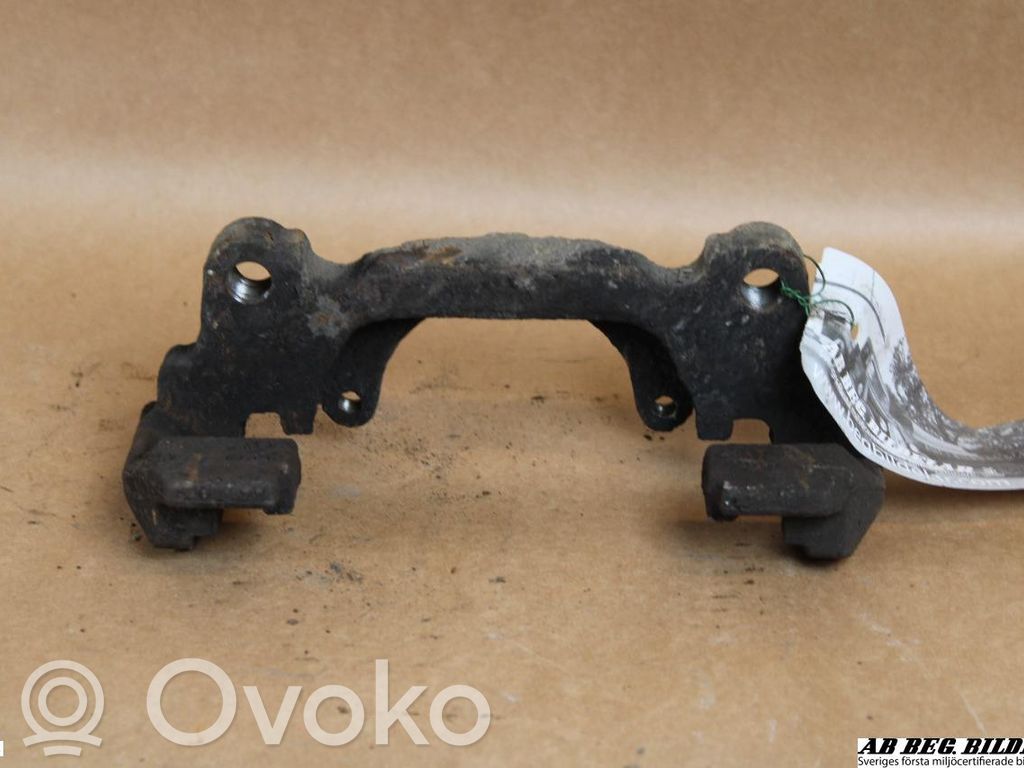 Volkswagen Touran I Plaquette / support d'étrier avant