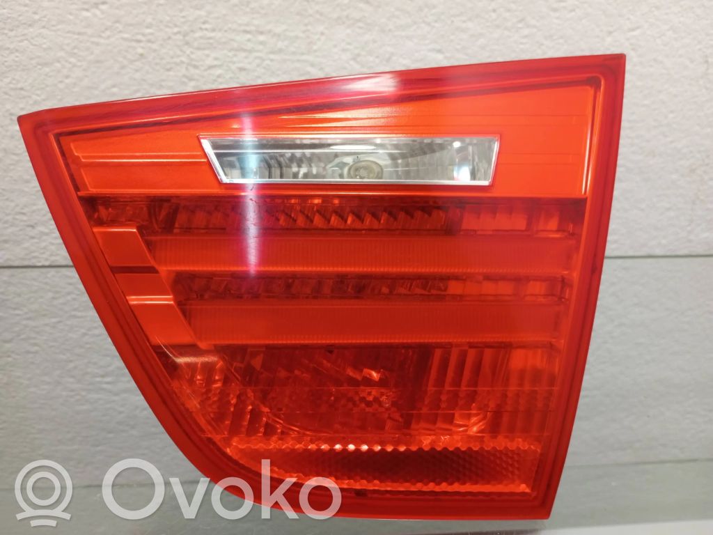 BMW 3 E90 E91 Aizmugurējais lukturis pārsegā 