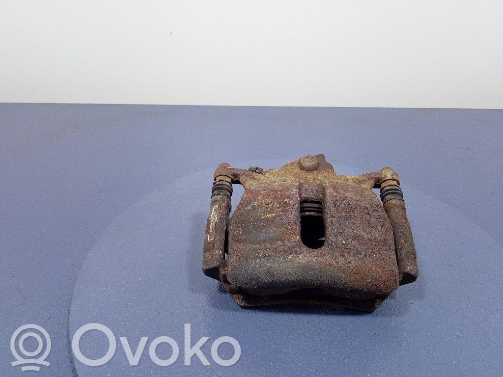 Volkswagen Golf Sportsvan Zacisk hamulcowy przedni 