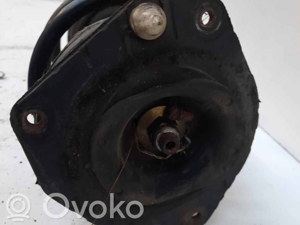 Renault Megane II Amortyzator osi przedniej ze sprężyną 