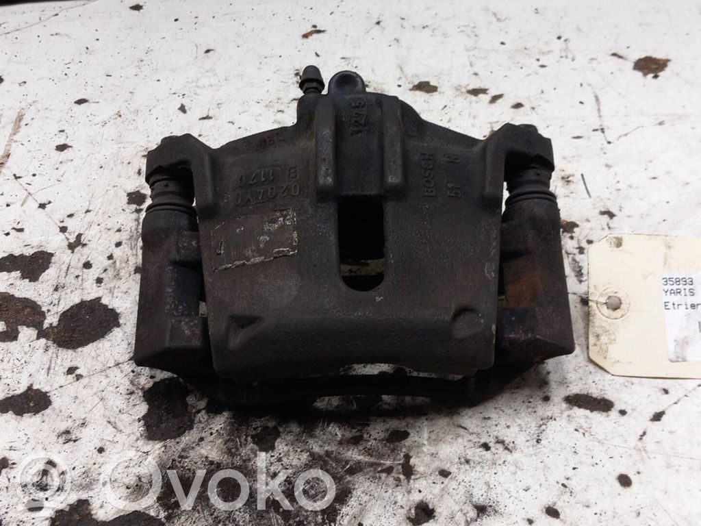 Toyota Yaris Zacisk hamulcowy przedni 