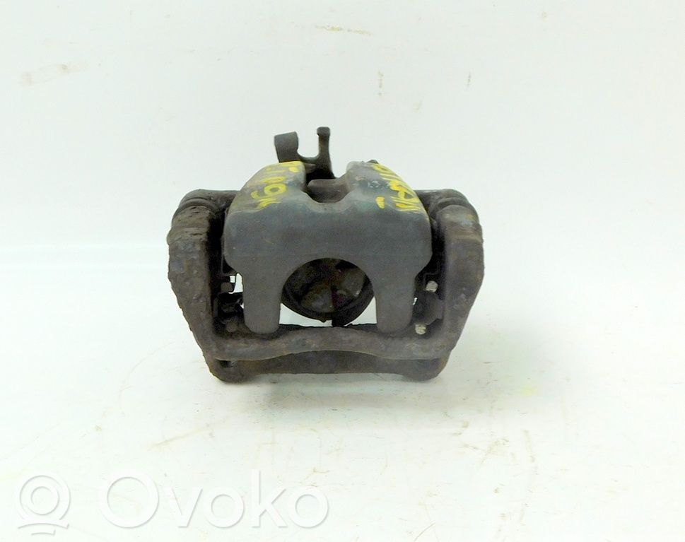 Opel Astra H Zacisk hamulcowy przedni 