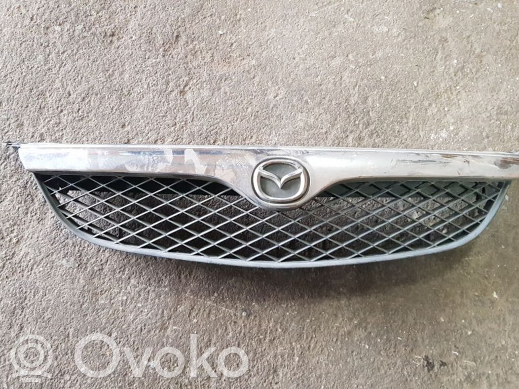 Mazda 626 Front bumper upper radiator grill 