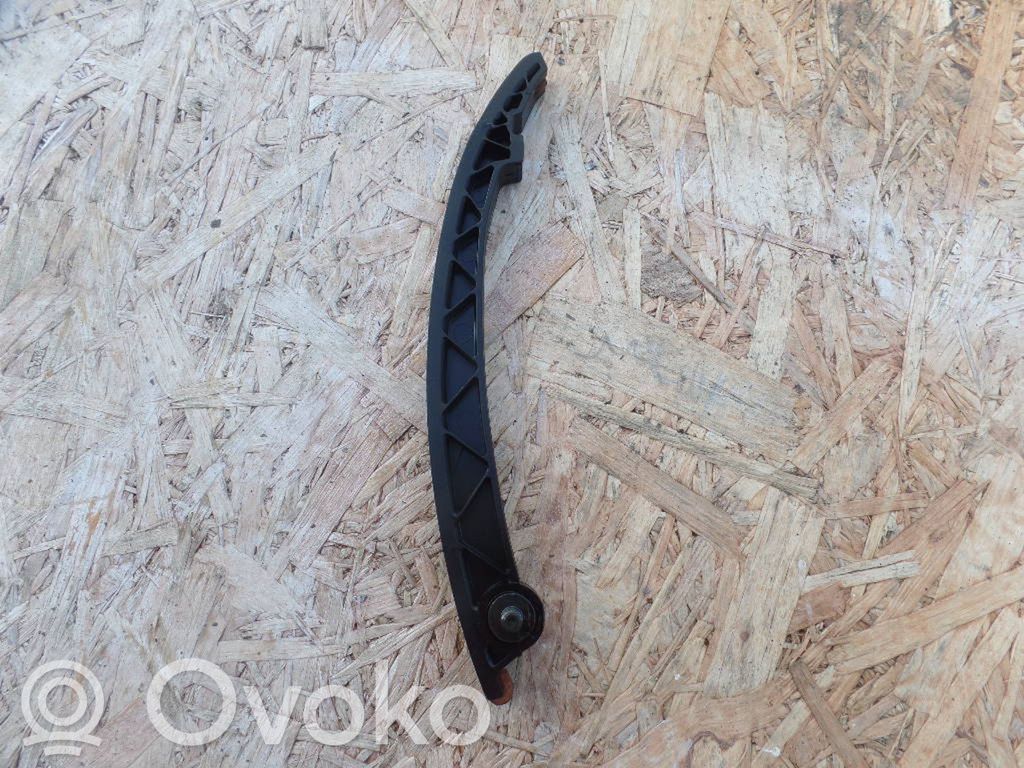 Opel Corsa D Jakohihnan liukukisko 
