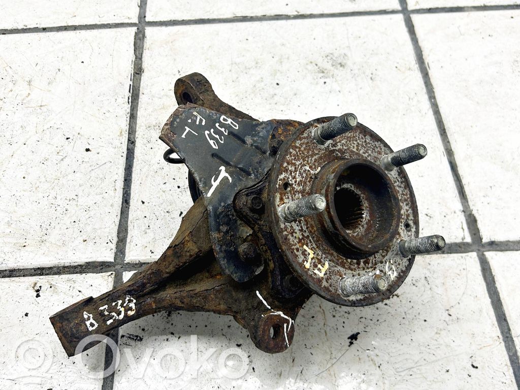 Front wheel hub spindle knuckle