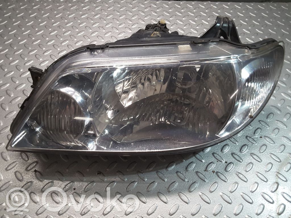 Mazda 323 F Headlight/headlamp 