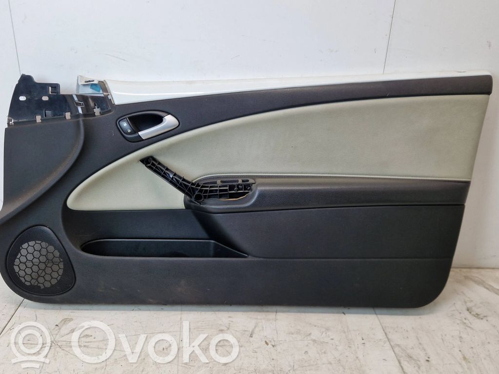 Front door card panel trim