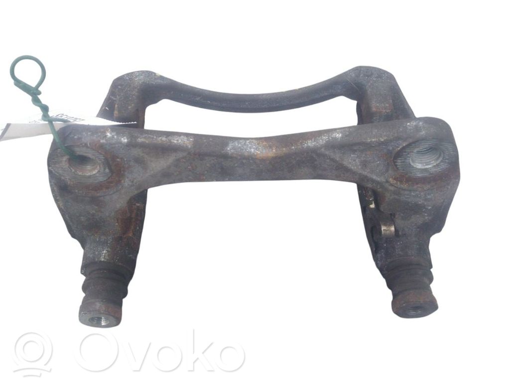 Plaquette / support d'étrier avant