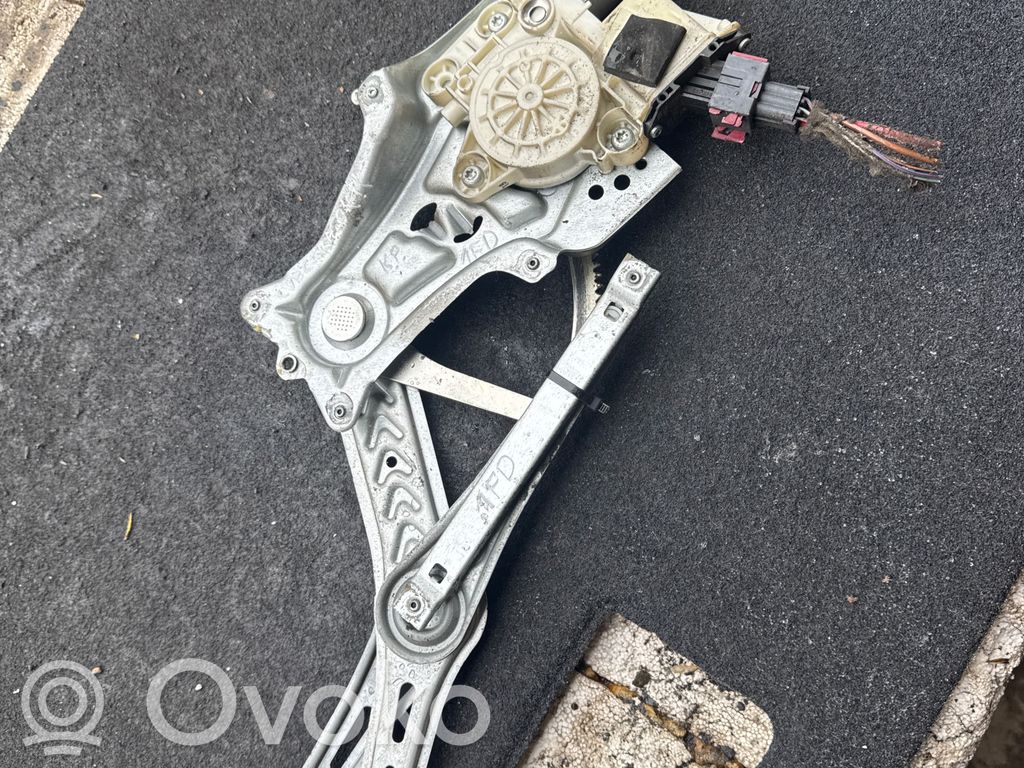 Opel Vectra C Elektryczny podnośnik szyby drzwi przednich 