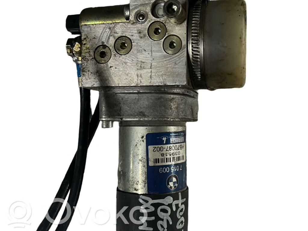 Bomba motor del muelle neumático del maletero   7015009