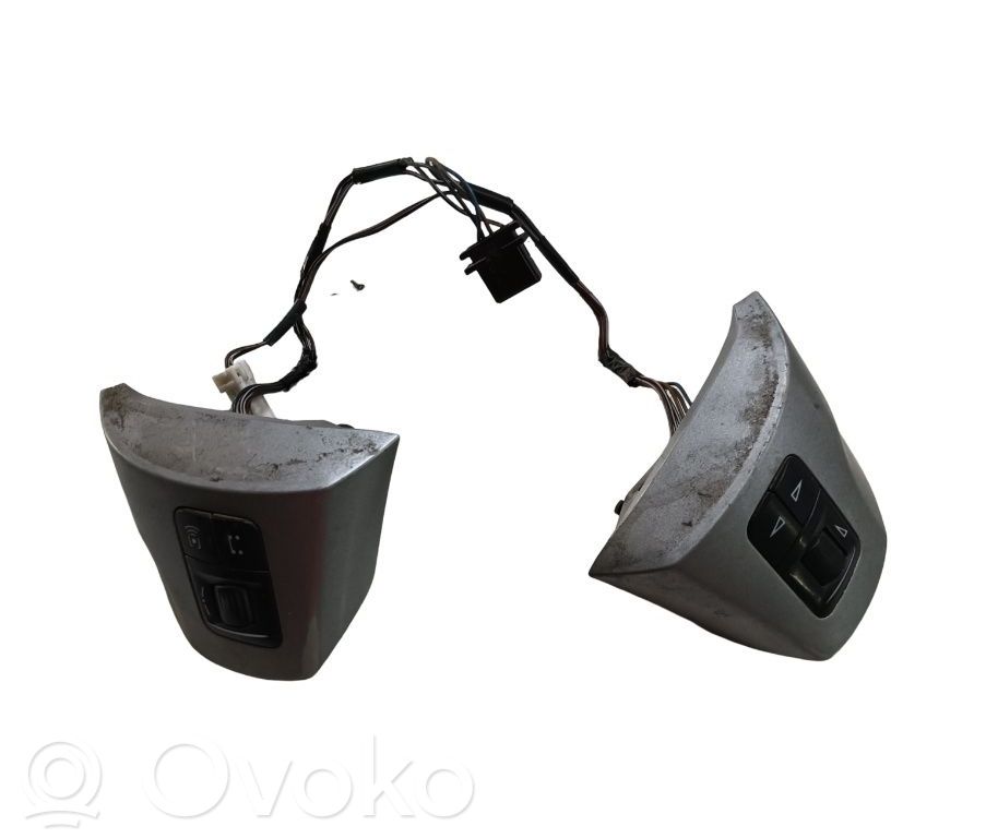 Opel Corsa D Pulsanti/interruttori sul volante 