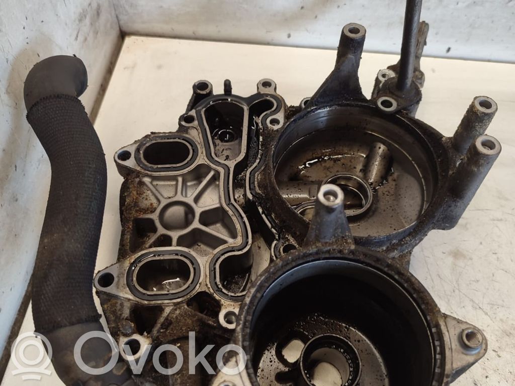 Volkswagen Touareg I Oil filter mounting bracket 