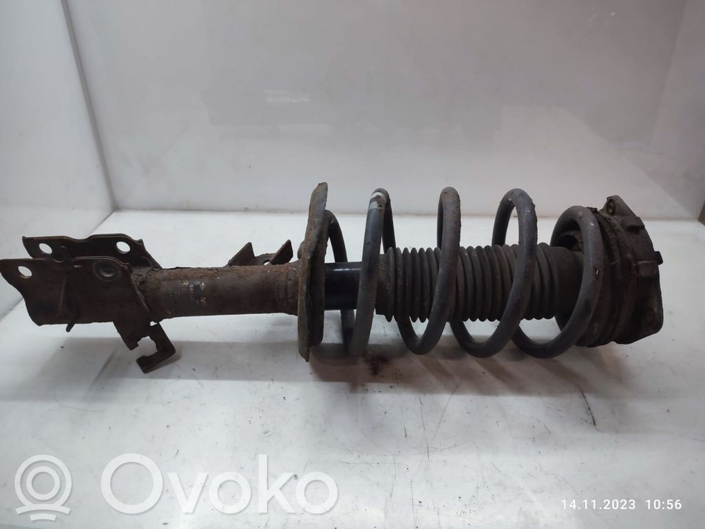 Nissan Qashqai+2 Amortyzator osi przedniej ze sprężyną 